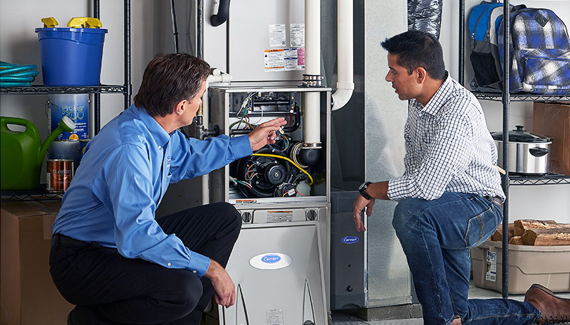 HVAC technician evaluating a furnace for repair or replacement in Pleasant Grove